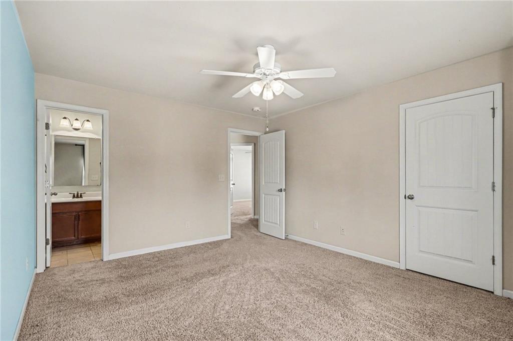 4208 Amberleaf Walk Lilburn, GA 30047 - Photo 26 of 33 a view of an empty room and fire place