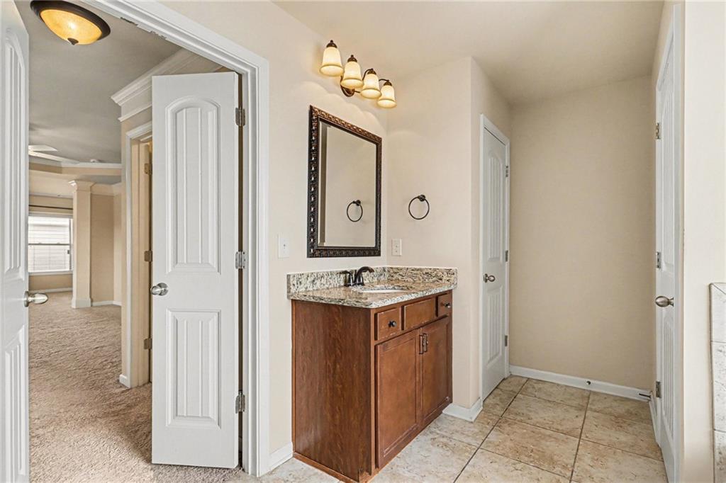 4208 Amberleaf Walk Lilburn, GA 30047 - Photo 6 of 33 a view of a hallway with front door