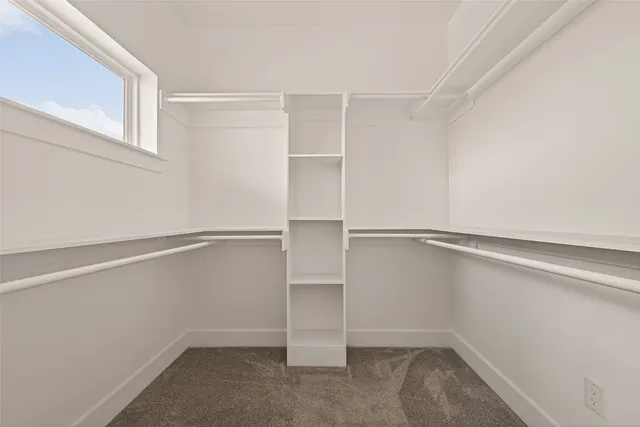 a view of an empty walk in closet
