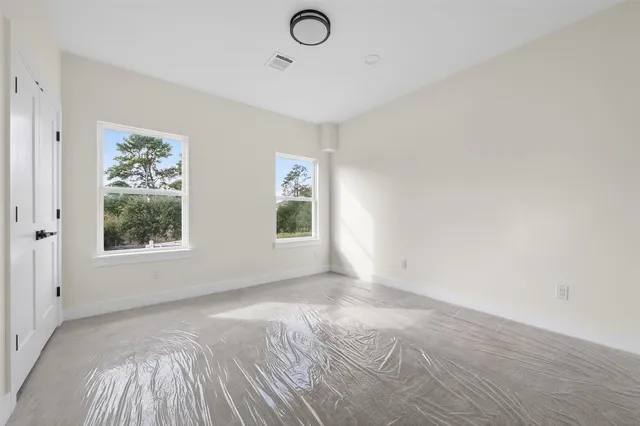 an empty room with windows