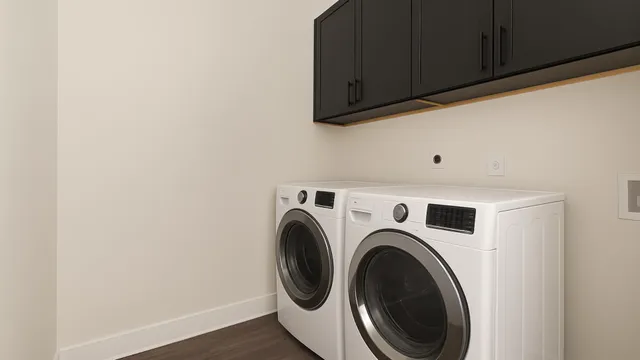 a utility room with dryer and washer