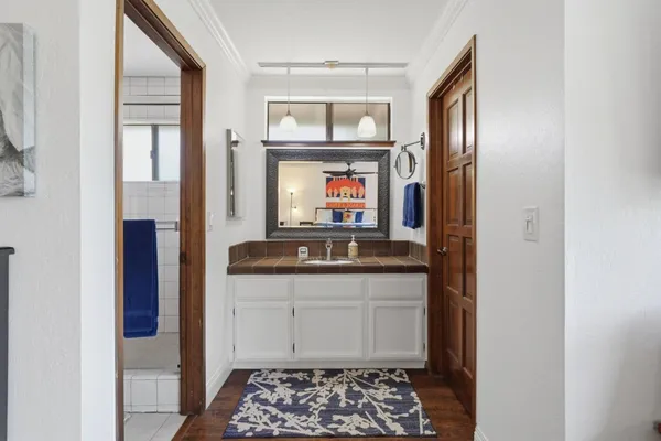 a room with a sink and a window