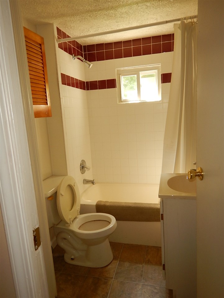 2571 Rileyville Road Rileyville, VA 22650 - Photo 14 of 28 a bathroom with a toilet and a shower