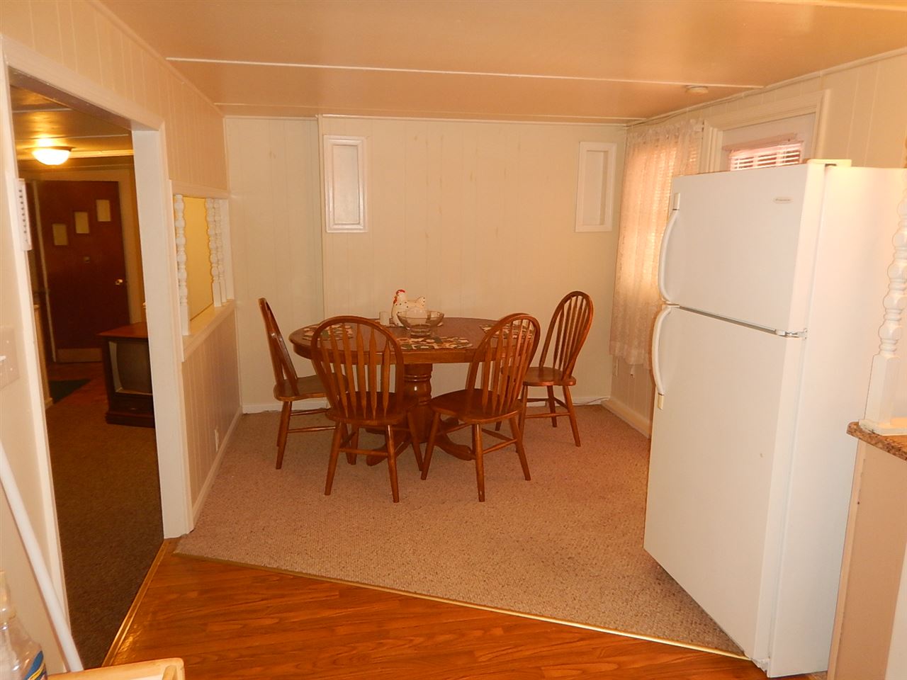 2571 Rileyville Road Rileyville, VA 22650 - Photo 3 of 28 a view of a dining room with furniture and a refrigerator