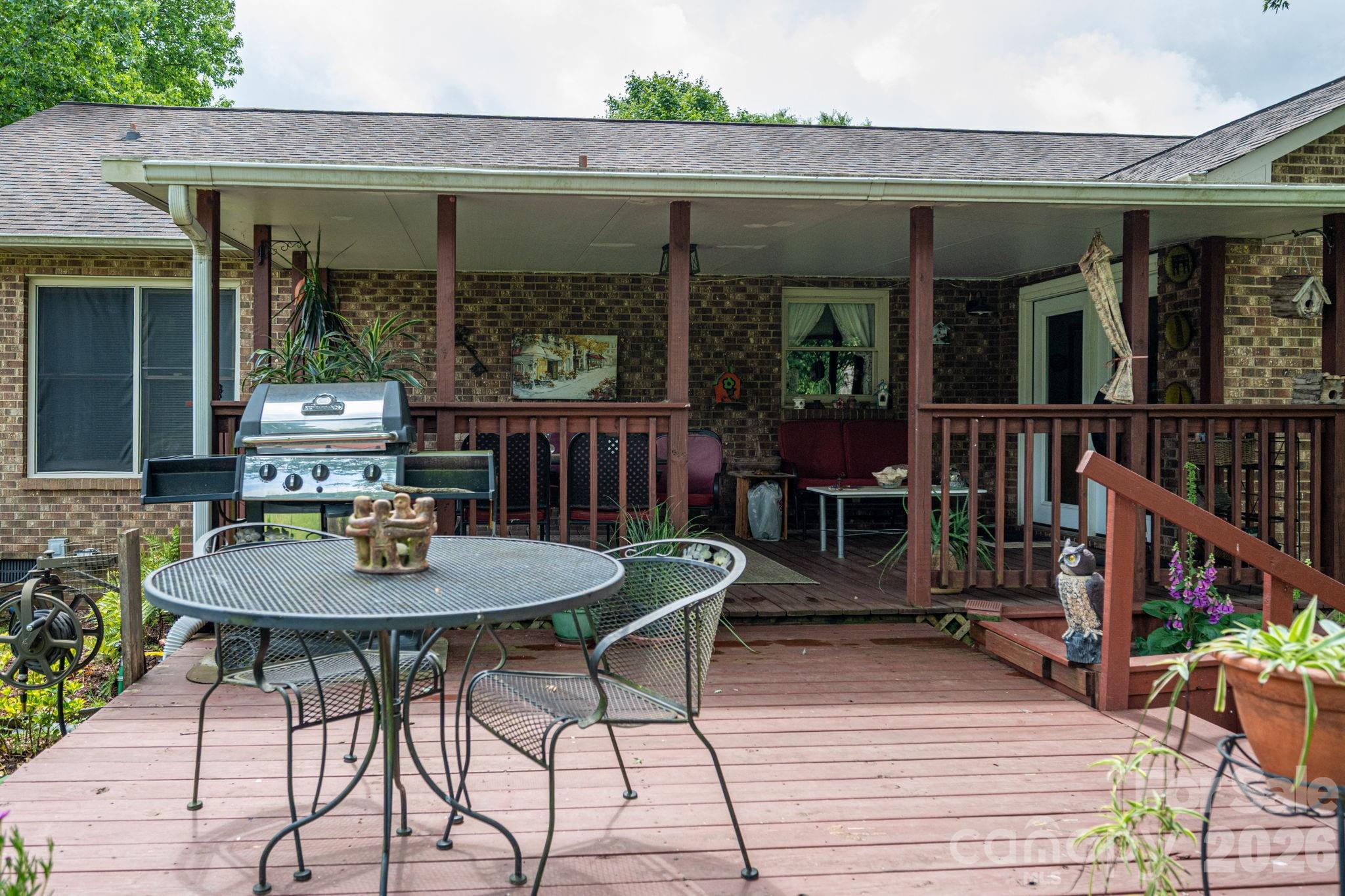 3815 Wildcherry Road Shelby, NC 28150 - Photo 31 of 33 a view of a patio with a table and chairs