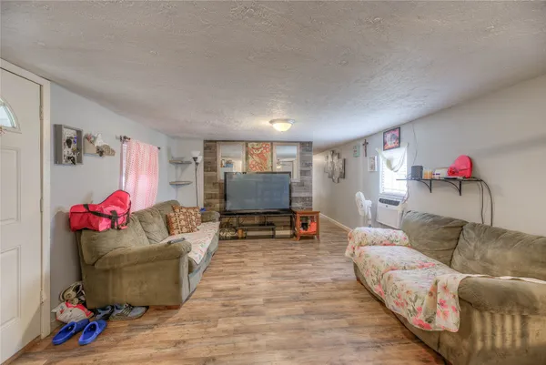 a living room with furniture and a couch