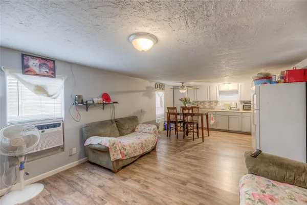 a living room with furniture and a table