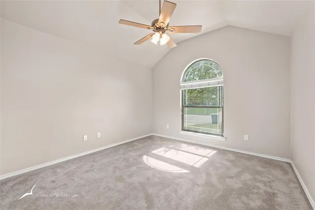 a bathroom with a sink double vanity and a mirror