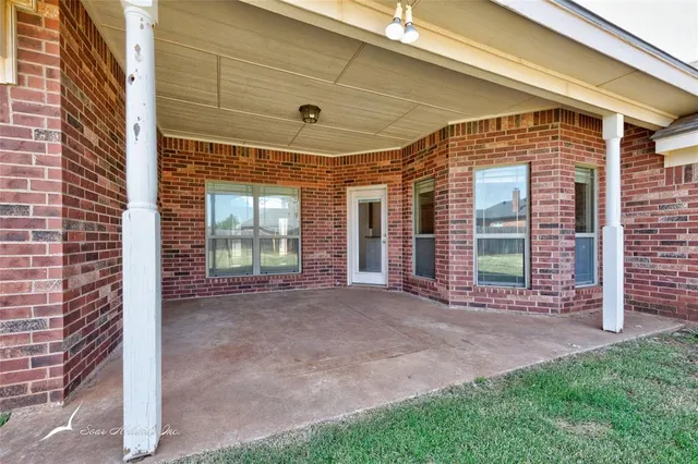 a view of a back yard of the house