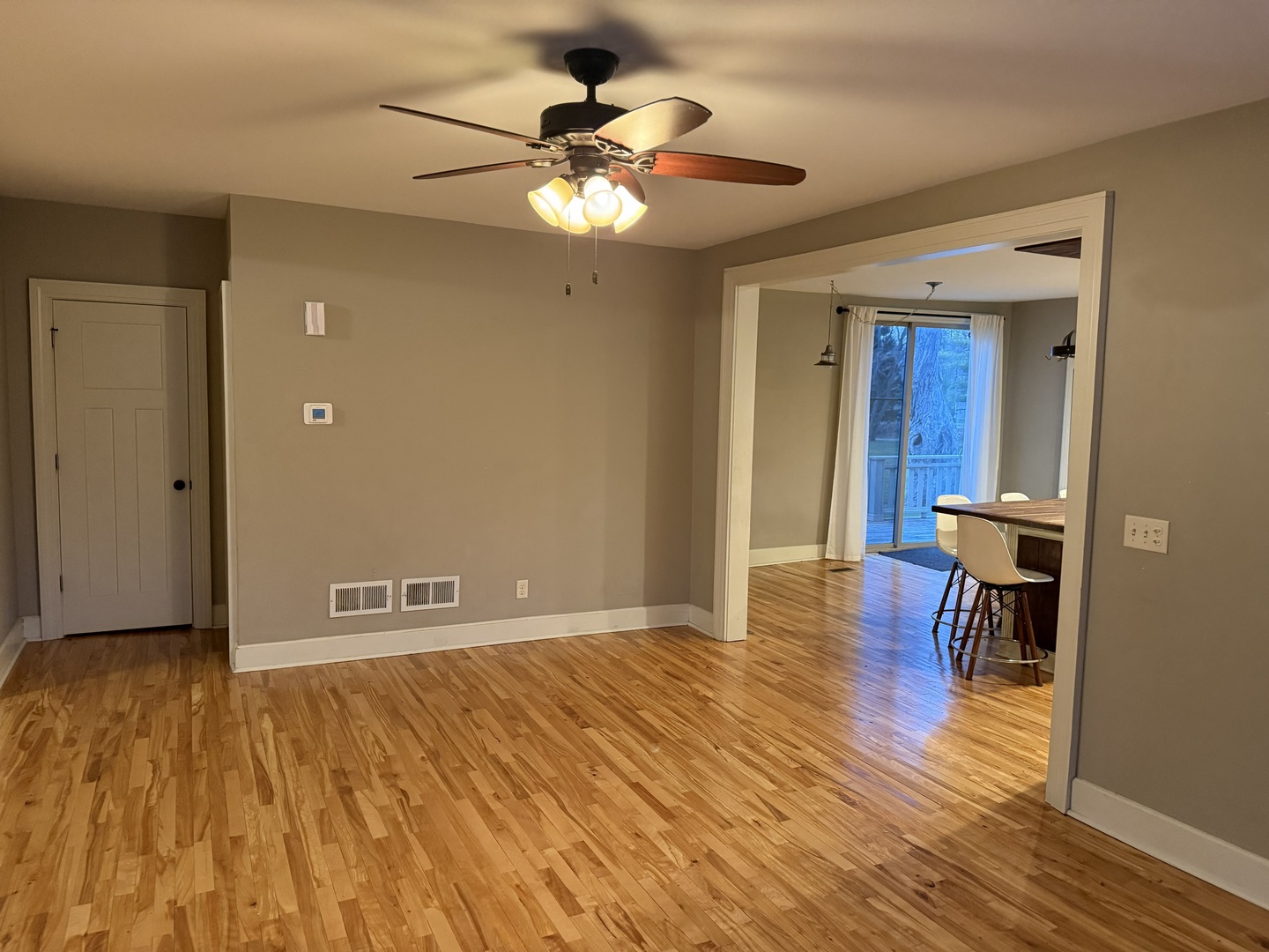 42W546 Highway 64 St. Charles, IL 60175 - Photo 11 of 18 a view of livingroom with hardwood floor and dining room