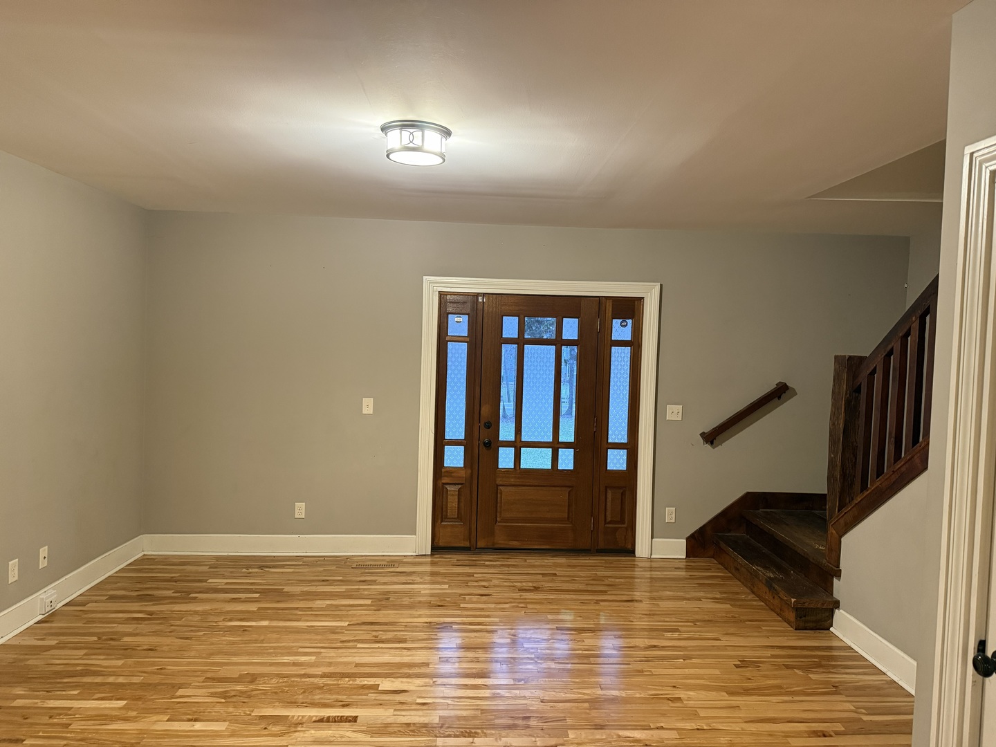 42W546 Highway 64 St. Charles, IL 60175 - Photo 3 of 18 a view of empty room with wooden floor and fan