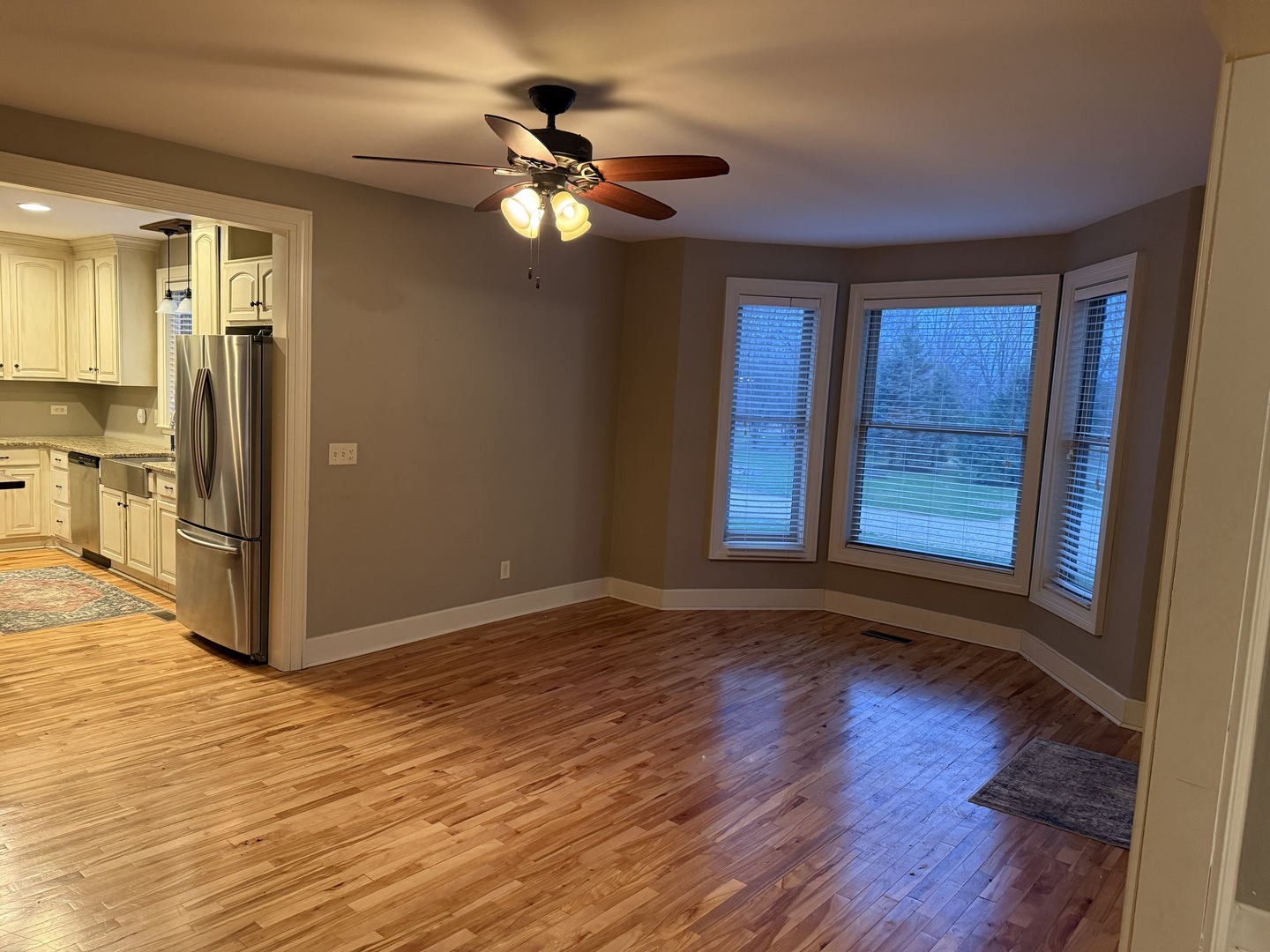 42W546 Highway 64 St. Charles, IL 60175 - Photo 6 of 18 a view of an empty room with window and wooden floor