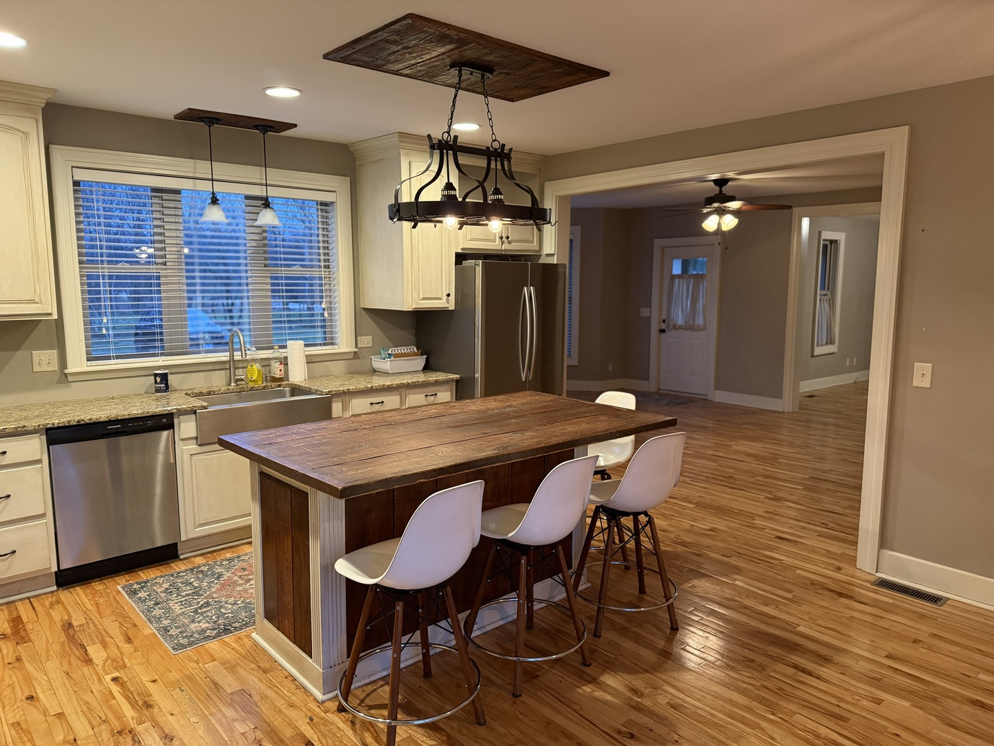 42W546 Highway 64 St. Charles, IL 60175 - Photo 9 of 18 a kitchen with a table chairs and wooden floor