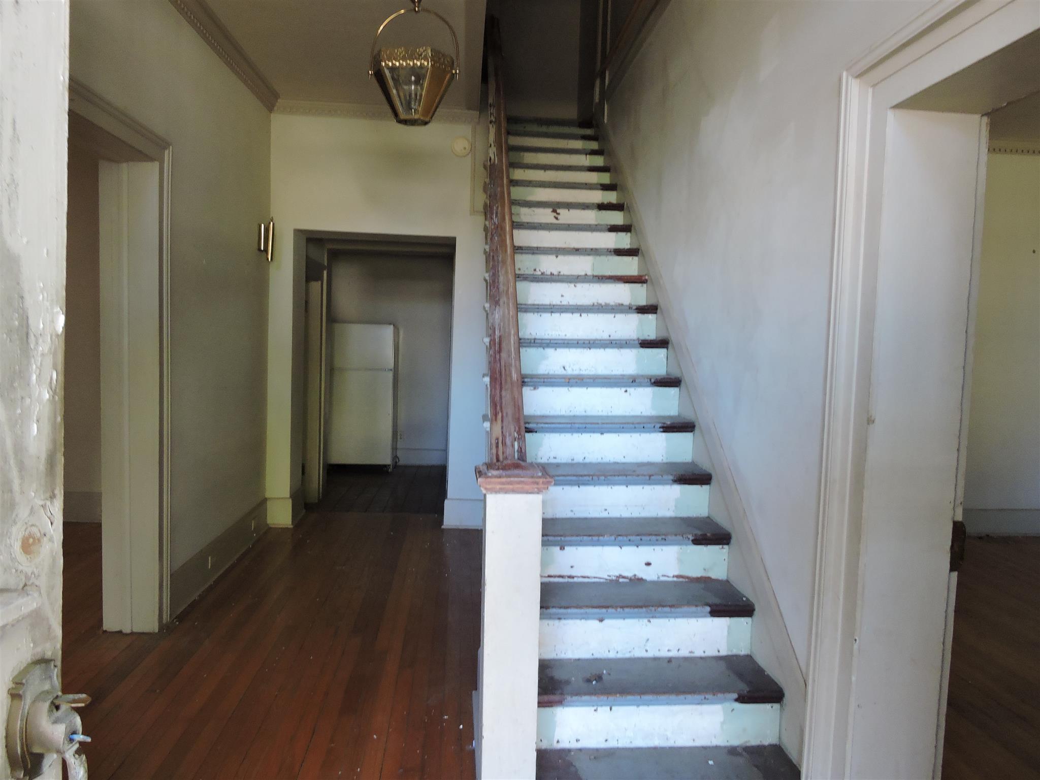 210 South High Street Winchester, TN 37398 - Photo 3 of 7 a view of entryway and hall with wooden floor
