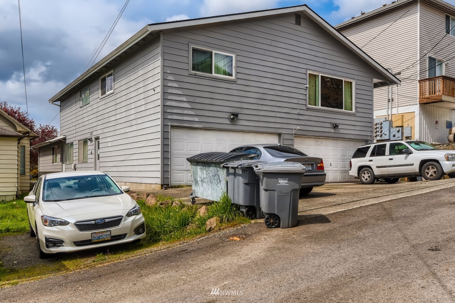 3325 Rockefeller Avenue Everett, WA 98201 - Photo 26 of 32 a car parked in front of a house