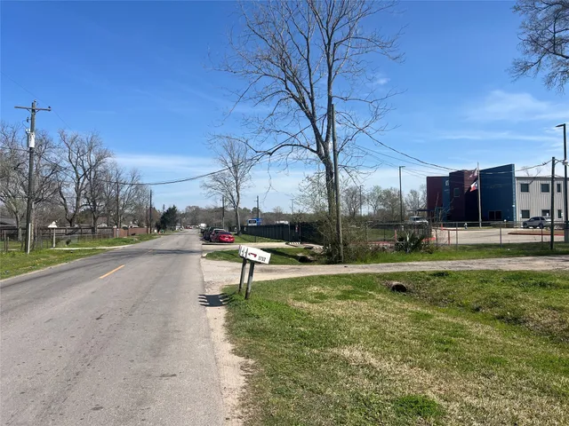 a view of a park with swings and slides