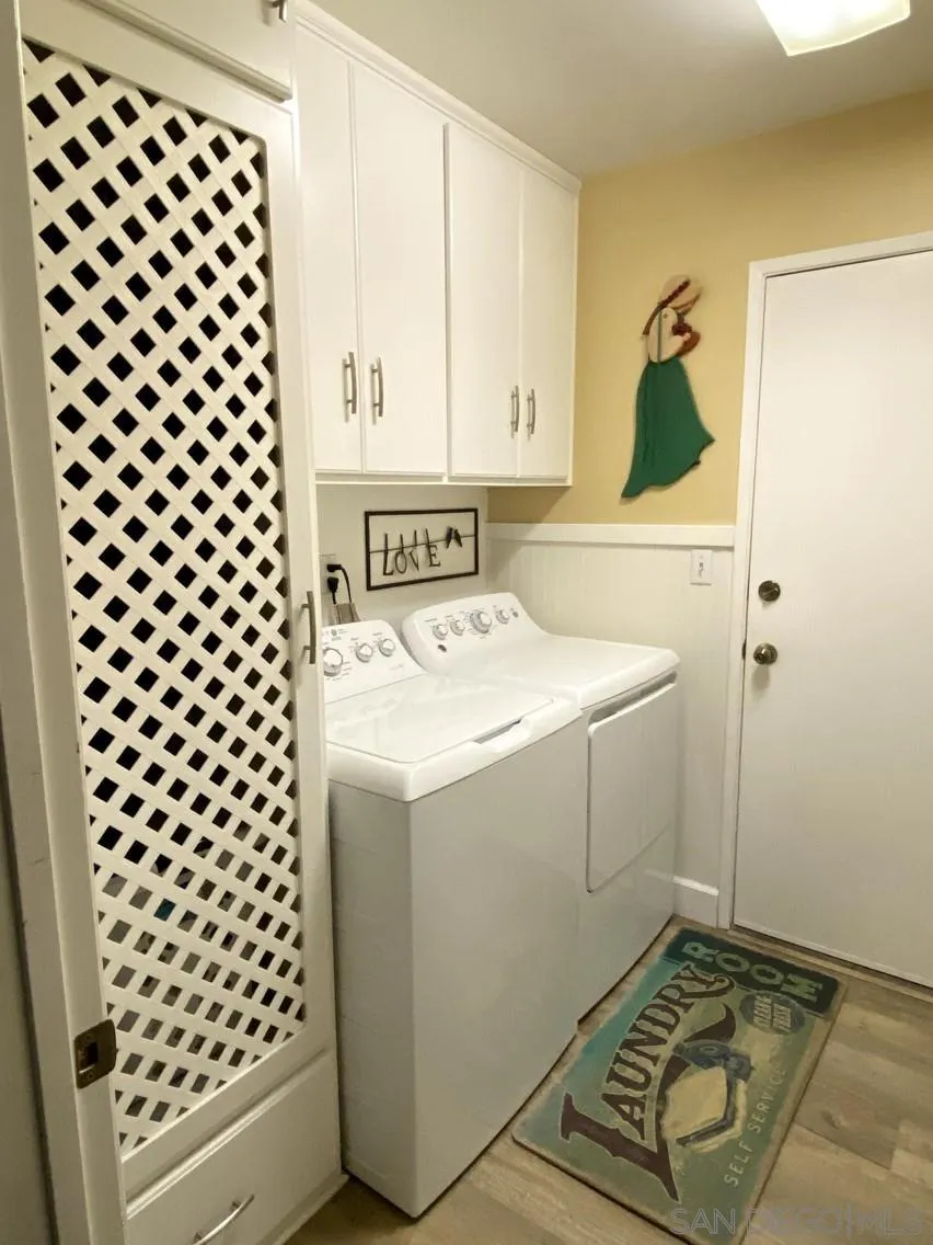 10835 Singletree Lane Spring Valley, CA 91978 - Photo 12 of 31 a utility room with dryer and washer