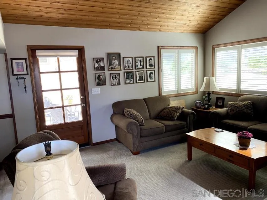 10835 Singletree Lane Spring Valley, CA 91978 - Photo 9 of 31 a living room with furniture and a window