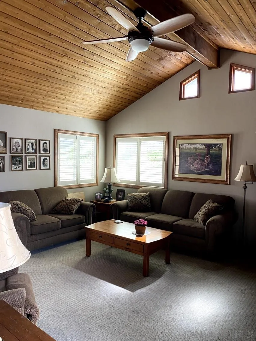 10835 Singletree Lane Spring Valley, CA 91978 - Photo 10 of 31 a living room with furniture and a window