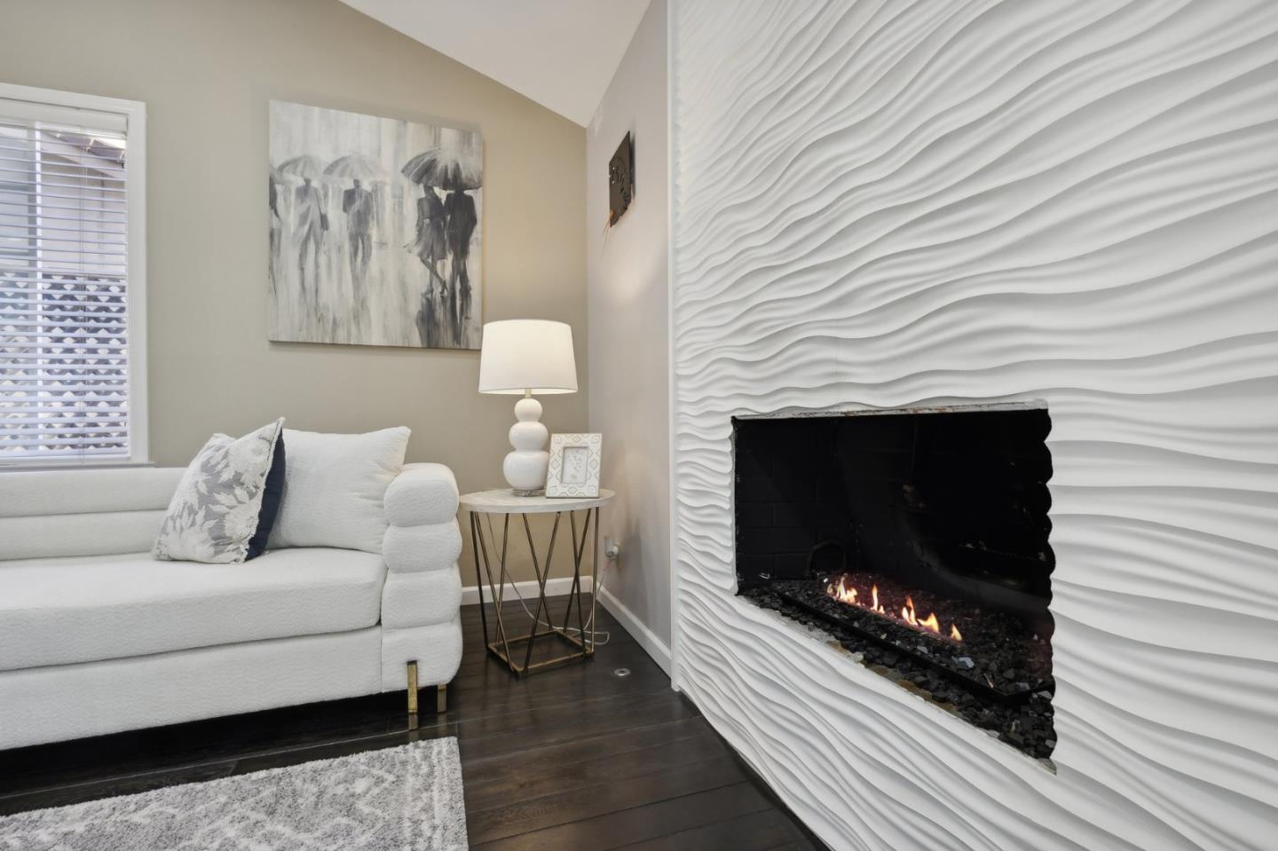 201 Prague Drive San Jose, CA 95119 - Photo 15 of 77 a living room with furniture a flat screen tv and a fireplace
