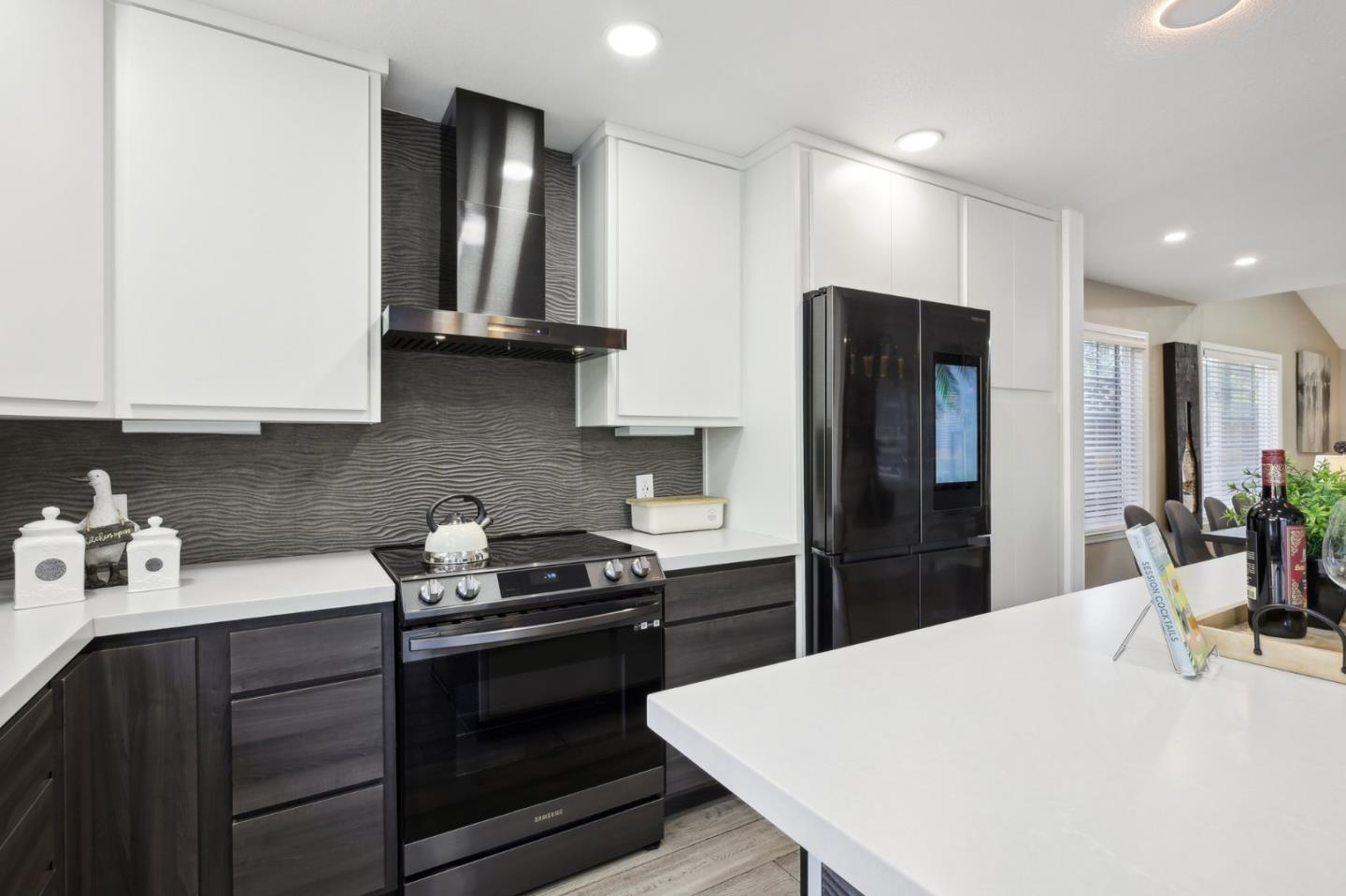 201 Prague Drive San Jose, CA 95119 - Photo 27 of 77 a kitchen with stainless steel appliances a refrigerator sink and stove