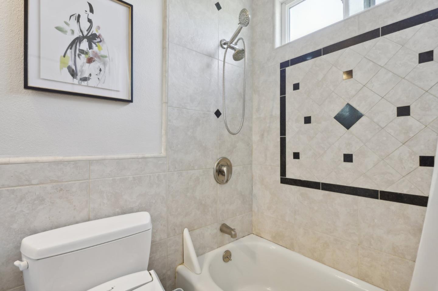 201 Prague Drive San Jose, CA 95119 - Photo 35 of 77 a bathroom with a toilet and a shower