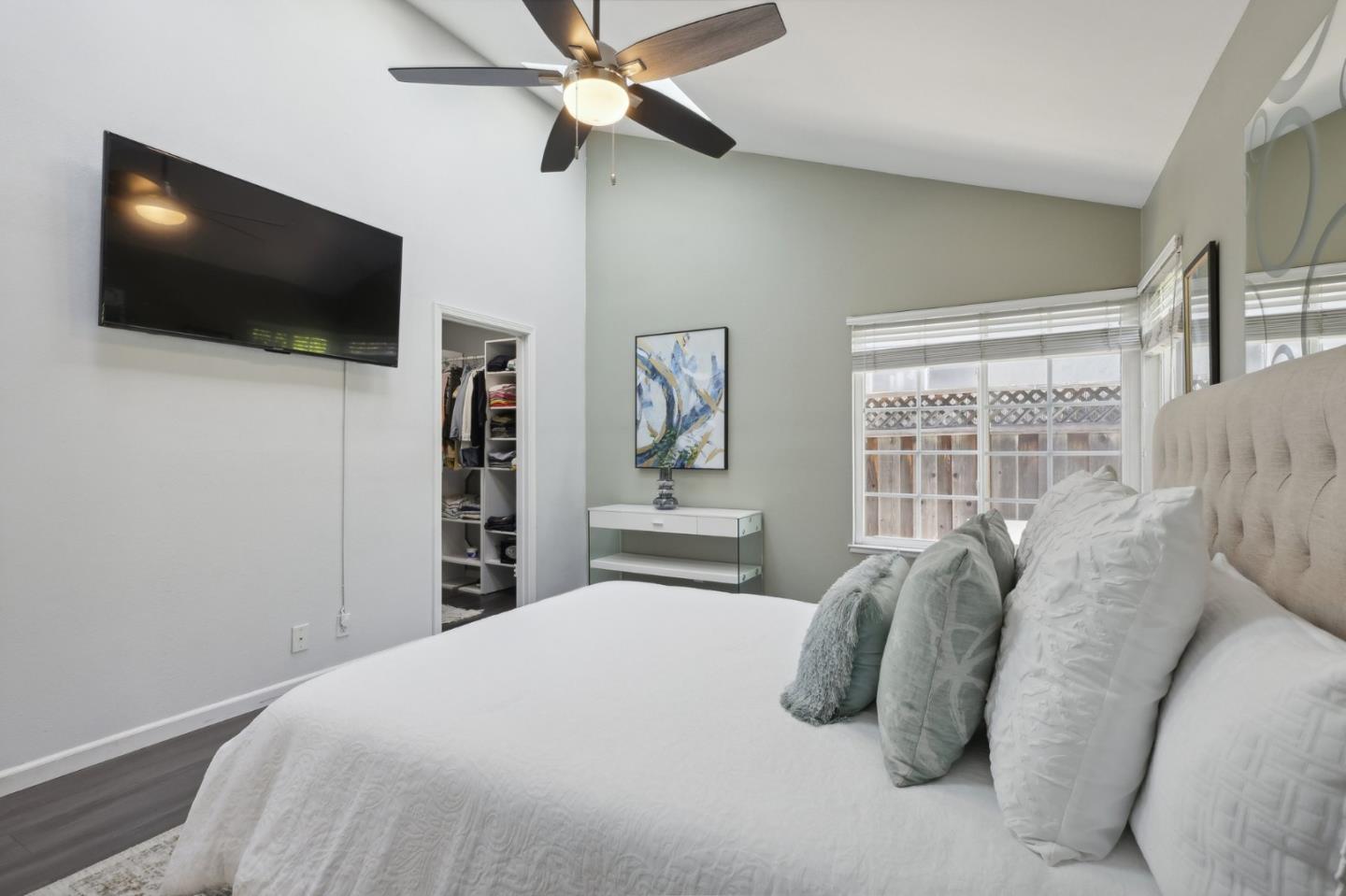 201 Prague Drive San Jose, CA 95119 - Photo 37 of 77 a bedroom with a large bed and a flat screen tv