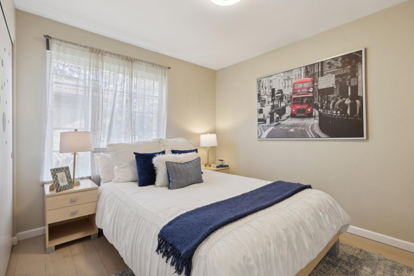 201 Prague Drive San Jose, CA 95119 - Photo 40 of 77 a bedroom with a bed and a painting on the wall