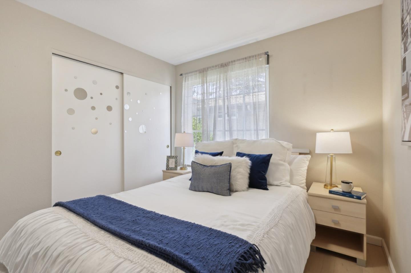 201 Prague Drive San Jose, CA 95119 - Photo 41 of 77 a bedroom with a bed and a lamp