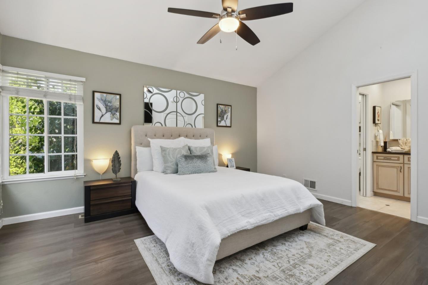 201 Prague Drive San Jose, CA 95119 - Photo 52 of 77 a bedroom with a bed and wooden floor