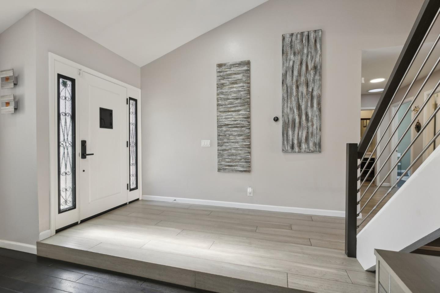 201 Prague Drive San Jose, CA 95119 - Photo 8 of 77 an empty room with wooden floor and windows