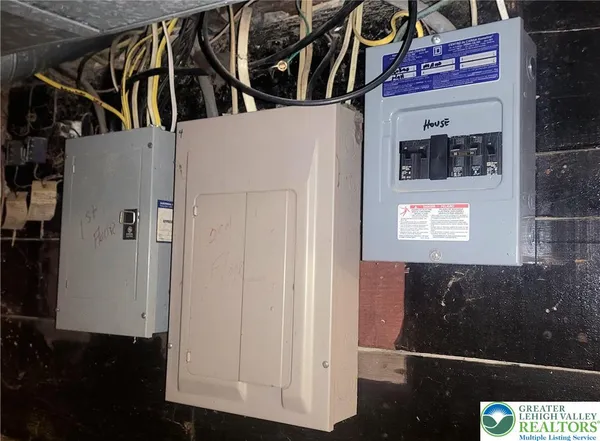a utility room with sink dryer and washer