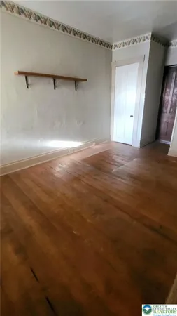 a view of a room with an empty space