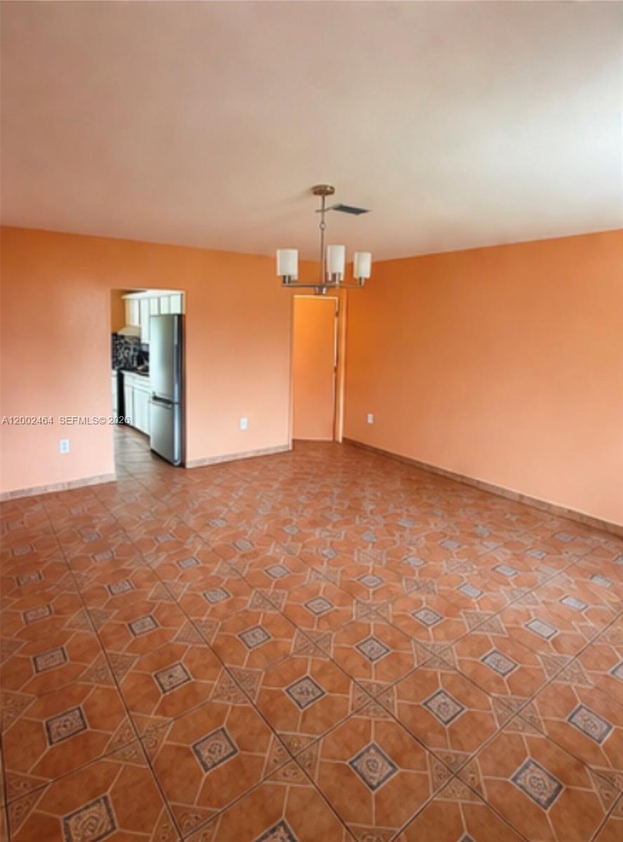 185 Northwest 82nd Street, Unit 1 Miami, FL 33150 - Photo 6 of 13 a view of a room with a cabinet