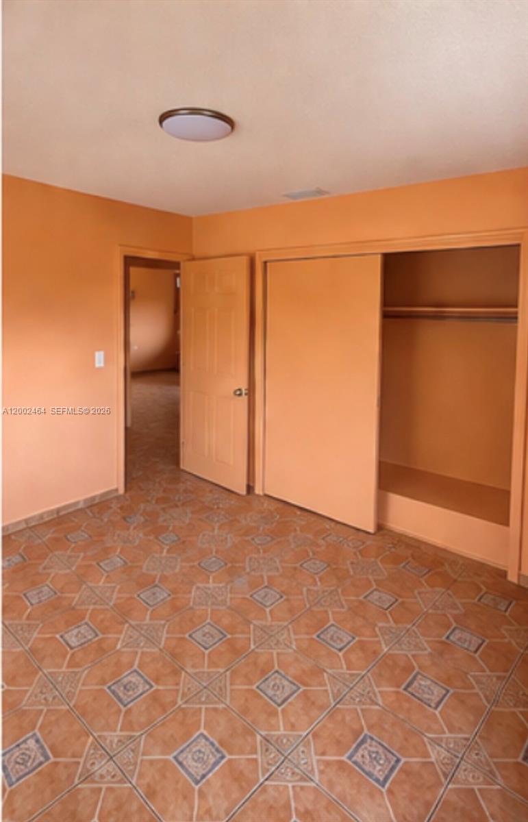 185 Northwest 82nd Street, Unit 1 Miami, FL 33150 - Photo 8 of 13 a view of empty room