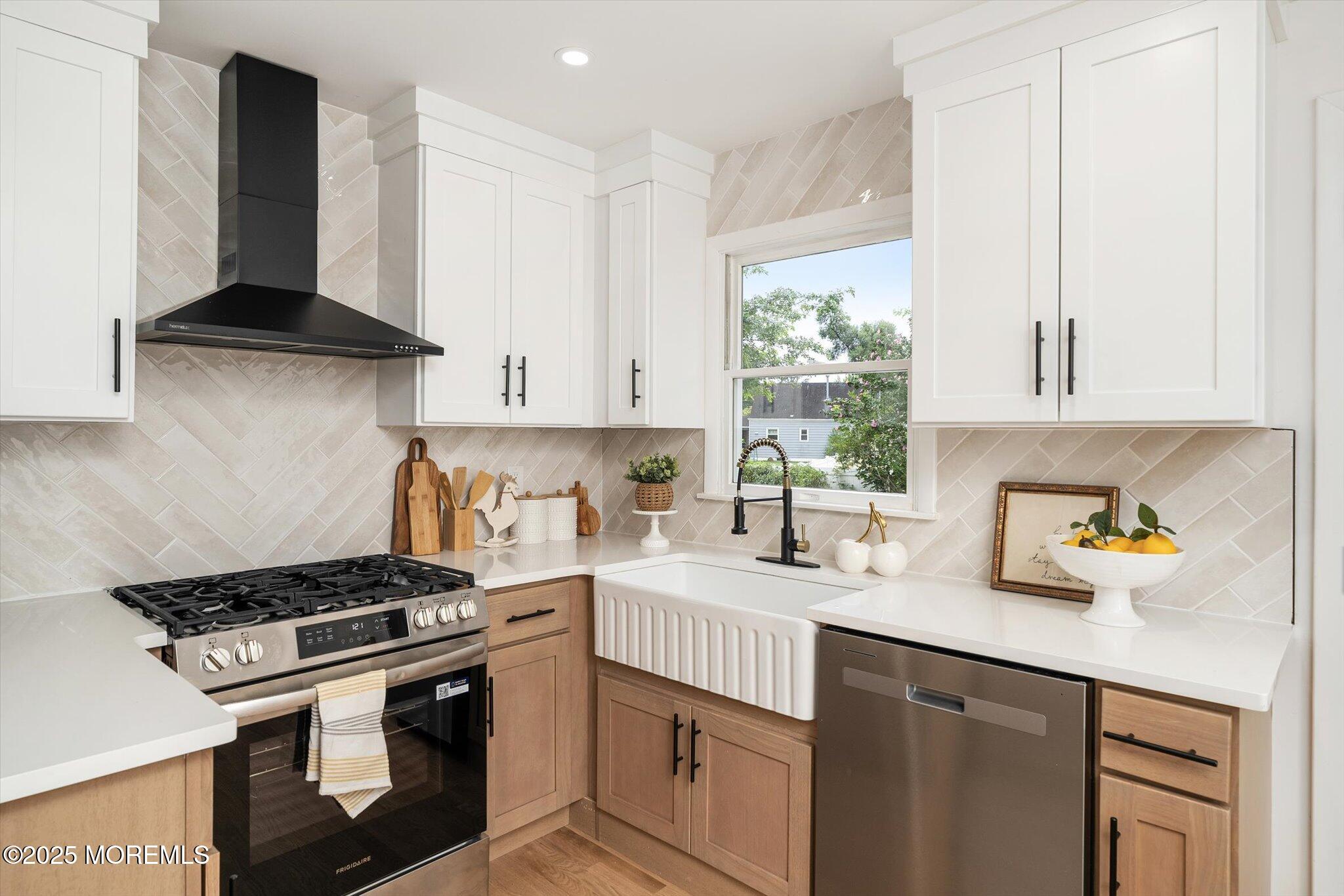 35 Waldron Road Allentown, NJ 08501 - Photo 11 of 39 a kitchen with stainless steel appliances a sink a stove and cabinets