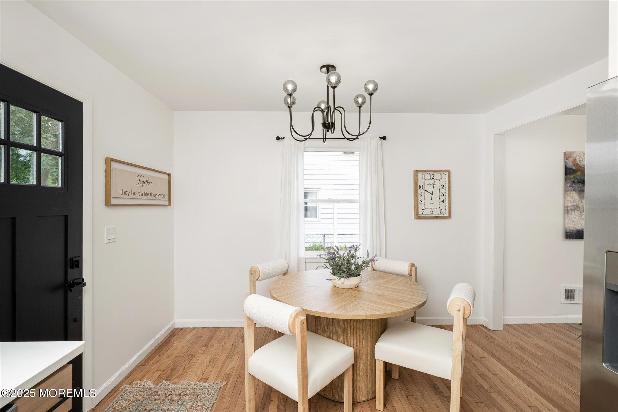 35 Waldron Road Allentown, NJ 08501 - Photo 14 of 39 a view of a dining room with furniture and wooden floor