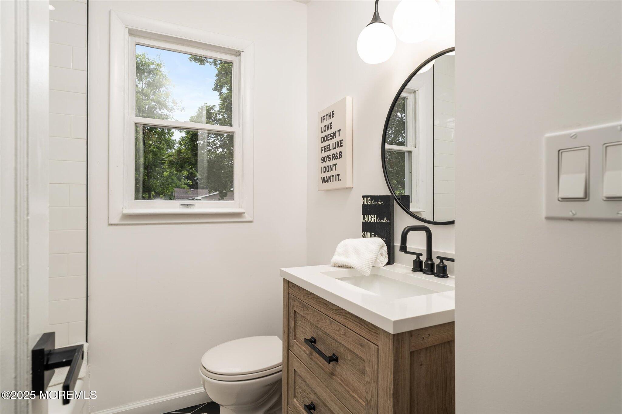 35 Waldron Road Allentown, NJ 08501 - Photo 15 of 39 a bathroom with a sink and a mirror