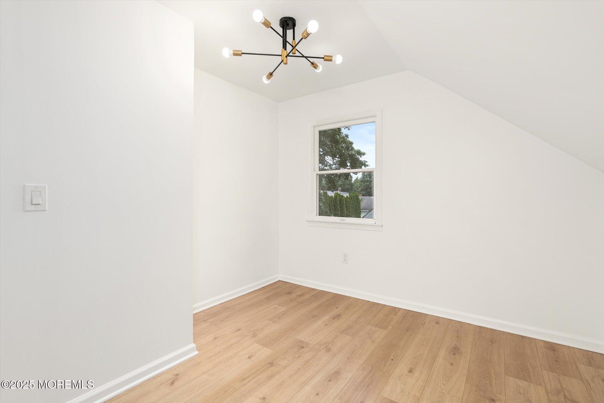 35 Waldron Road Allentown, NJ 08501 - Photo 21 of 39 an empty room with a window and a ceiling fan