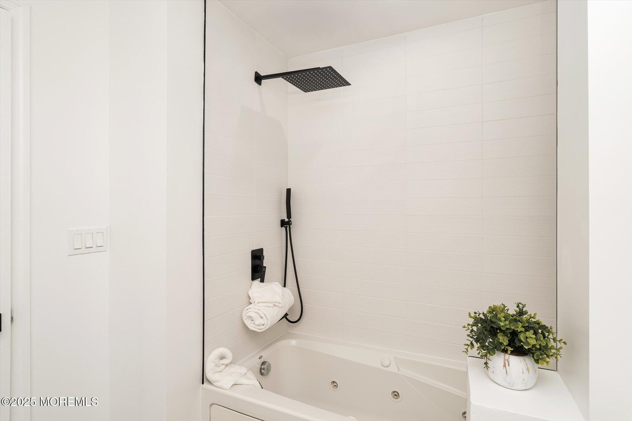 35 Waldron Road Allentown, NJ 08501 - Photo 25 of 39 a bath room with a bath tub and a shower