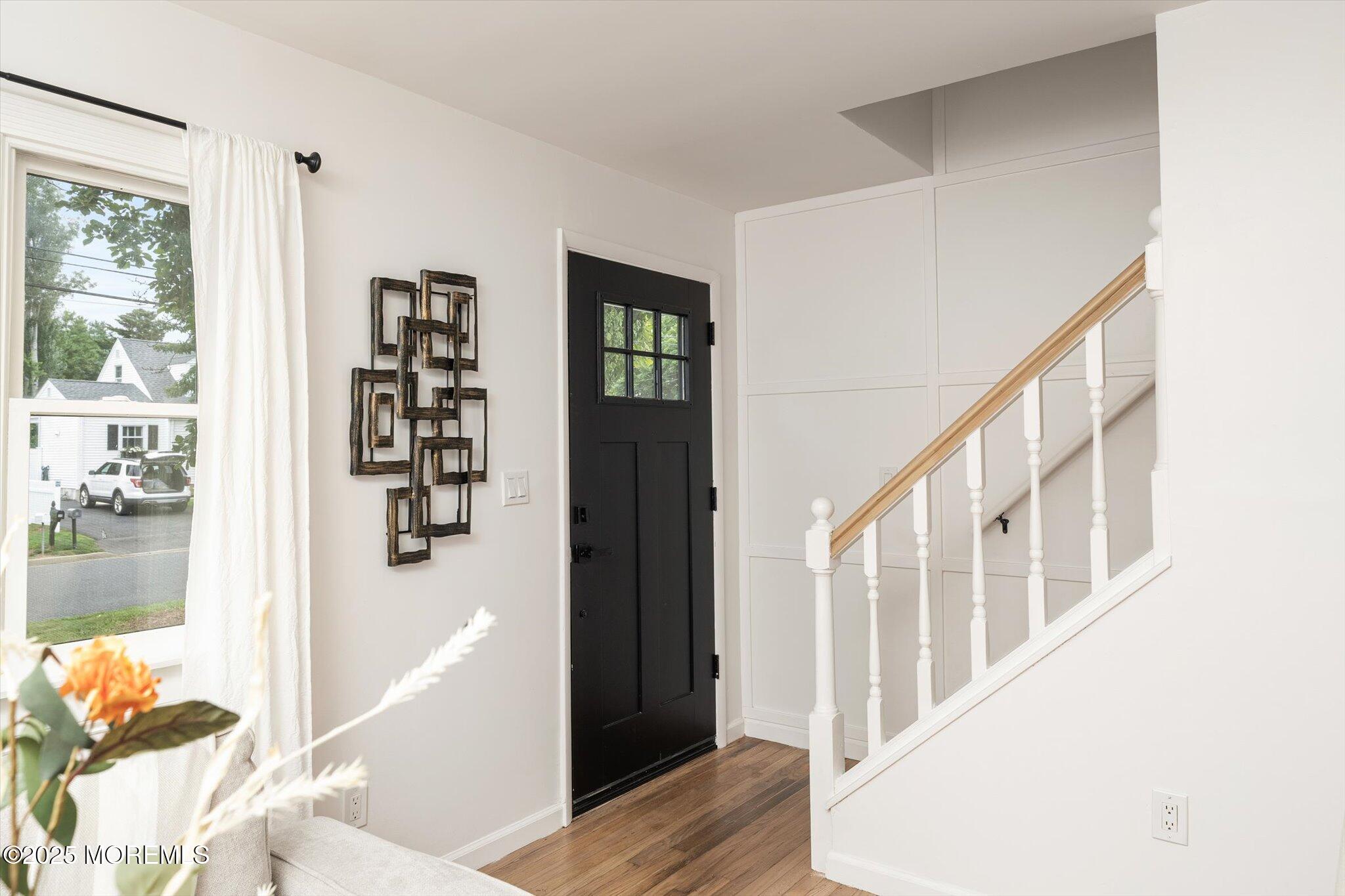 35 Waldron Road Allentown, NJ 08501 - Photo 8 of 39 a view of an entryway with wooden floor and windows