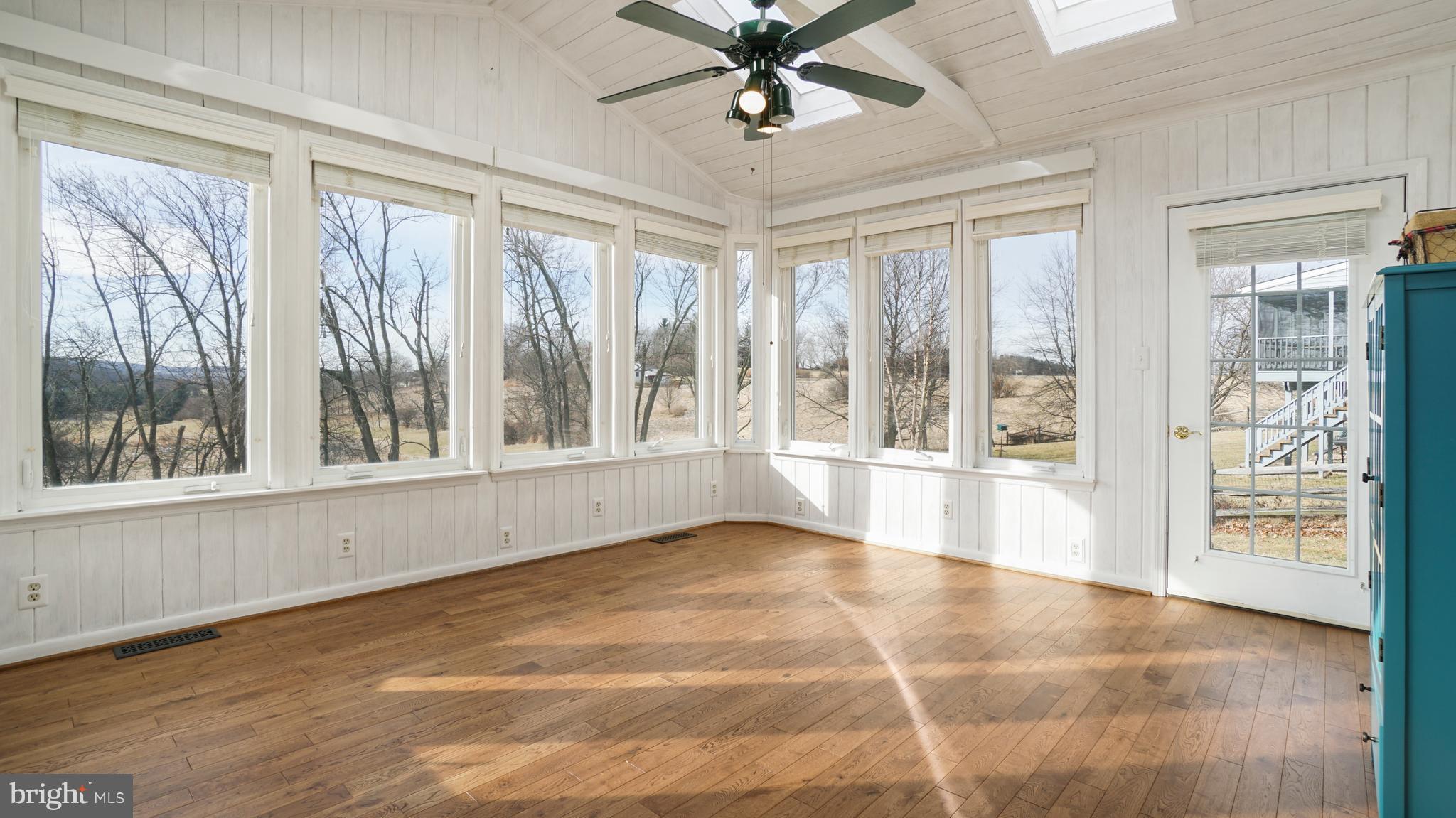 949 Firestone Road Westminster, MD 21158 - Photo 5 of 30 Sun Room with hardwoods & views