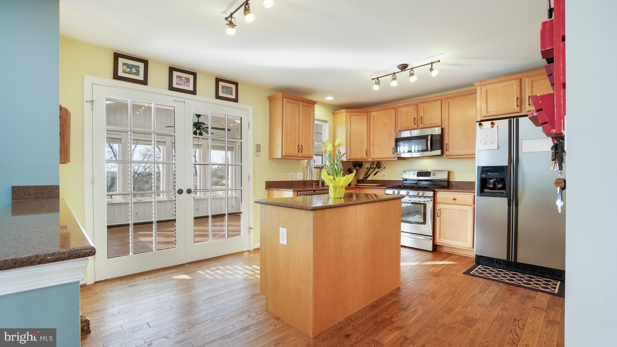 949 Firestone Road Westminster, MD 21158 - Photo 8 of 30 Hardwoods and access to the Sun Room