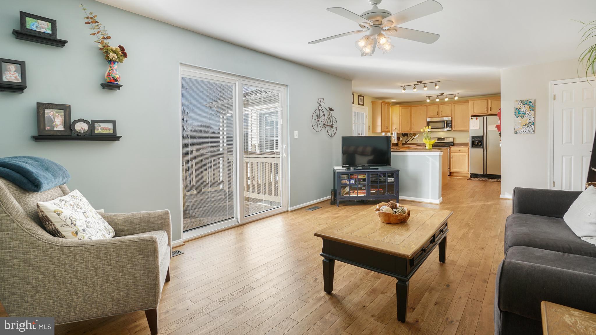 949 Firestone Road Westminster, MD 21158 - Photo 9 of 30 Hardwood Floors into the kitchen
