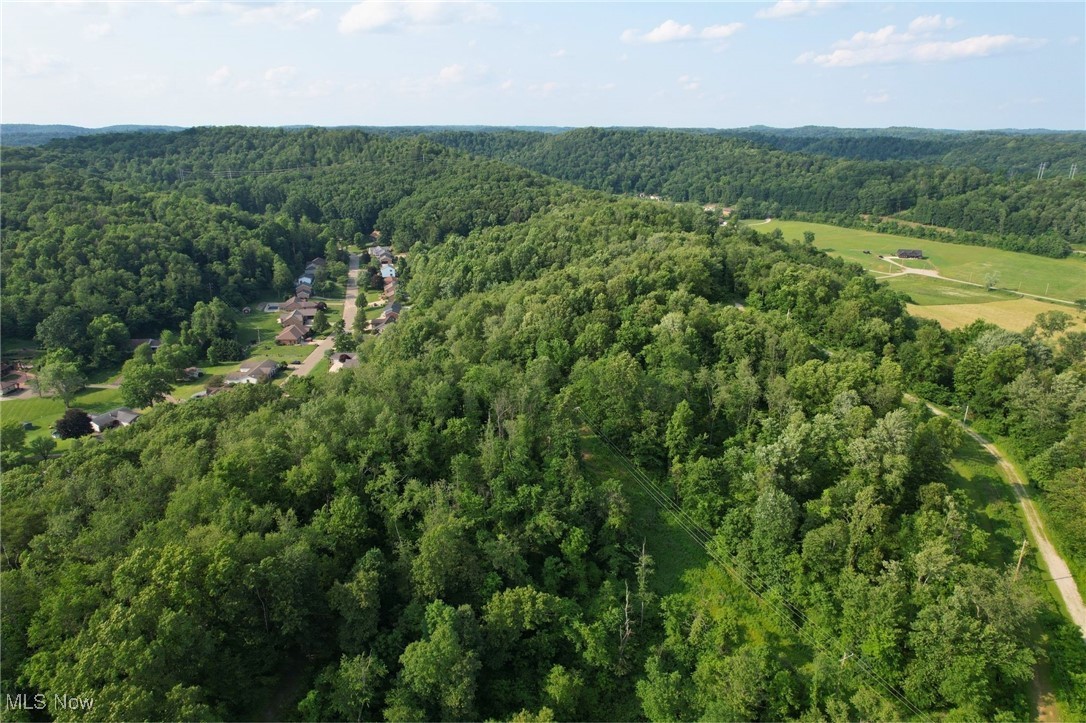 Deer Hill Road Dennison, OH 44621 - Photo 10 of 11 Aerial view of property and surrounding area featuring a forest