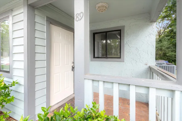 a front view of a house with a porch