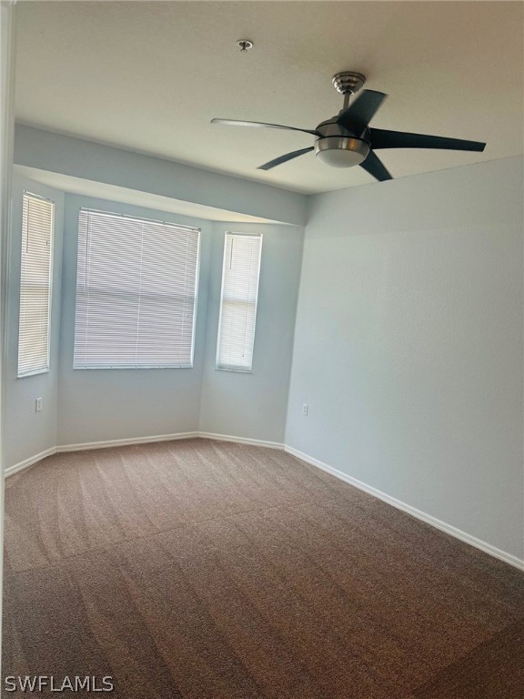 8550 Kingbird Loop, Unit 642 Estero, FL 33967 - Photo 11 of 14 a view of an empty room with a window