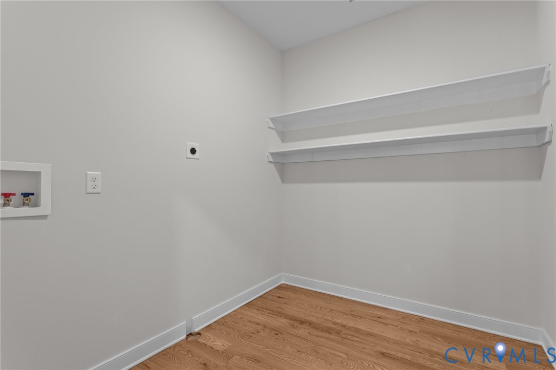 1218 Old Hundred Road Midlothian, VA 23114 - Photo 18 of 37 Laundry area featuring light wood-style flooring,