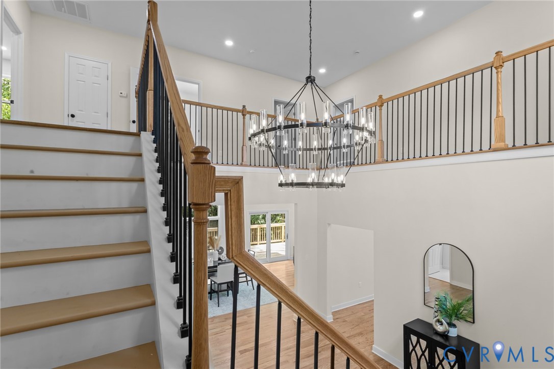 1218 Old Hundred Road Midlothian, VA 23114 - Photo 22 of 37 Staircase with plenty of natural light, wood finis