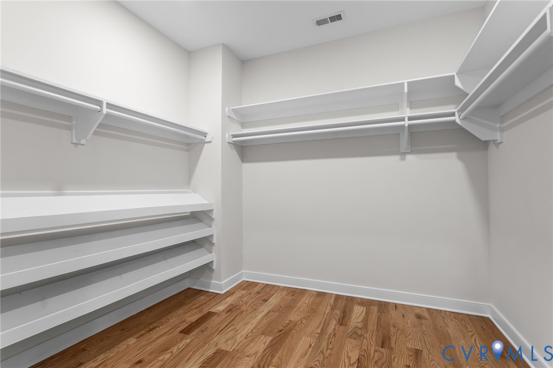 1218 Old Hundred Road Midlothian, VA 23114 - Photo 27 of 37 Walk in closet featuring light wood-type flooring